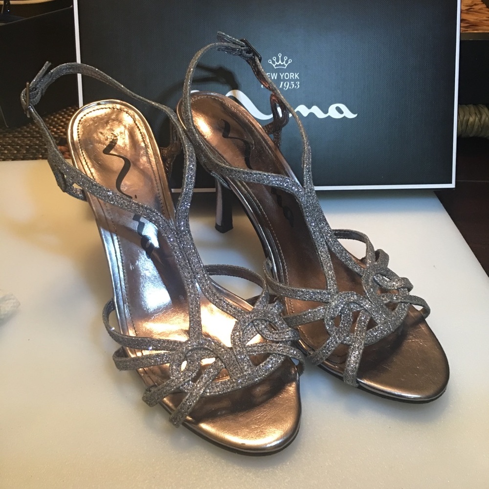 Nina heels in platinum/silver sparkled, worn once.